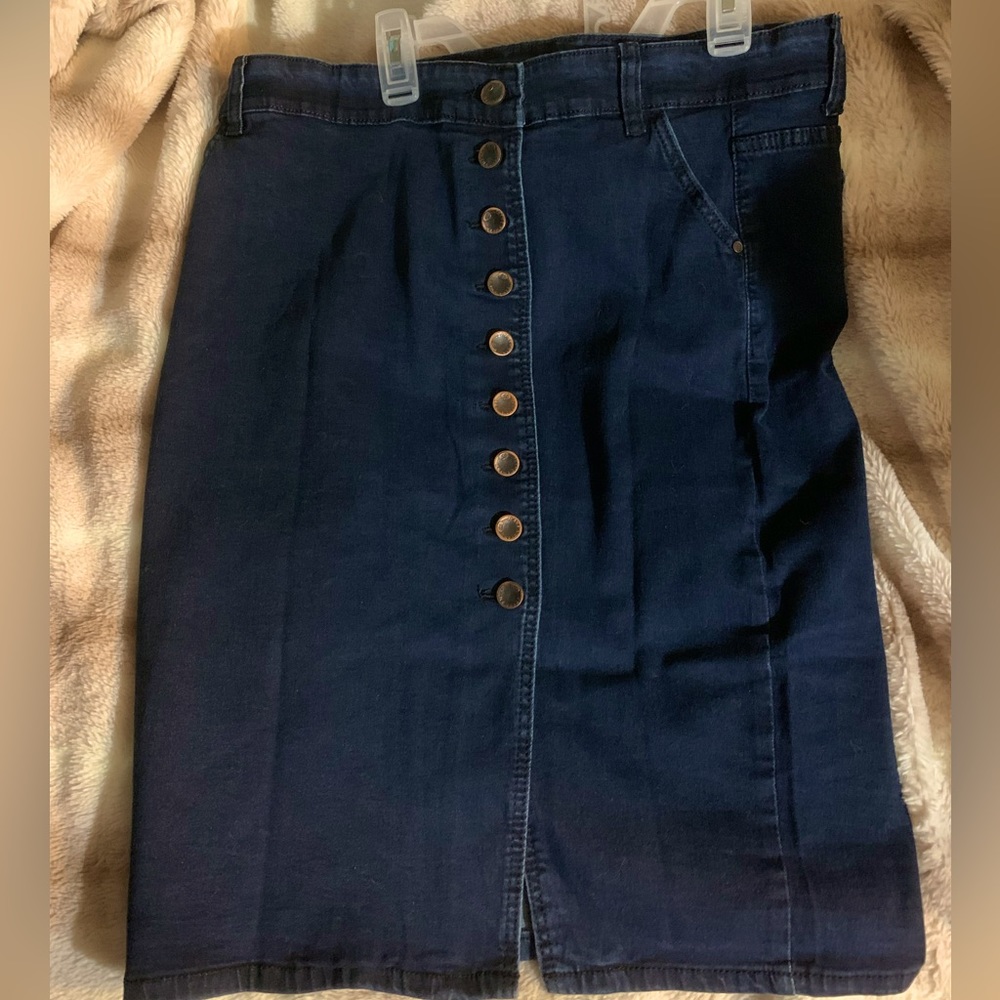 DTYNZ fashion jean skirt. Button closure with split at bottom. High waist skirt